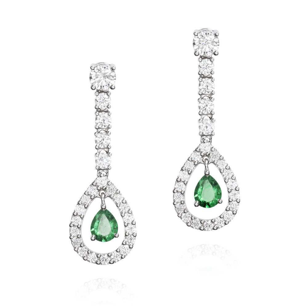 Long 18K gold earrings with emeralds and 1.24 carats of diamonds.